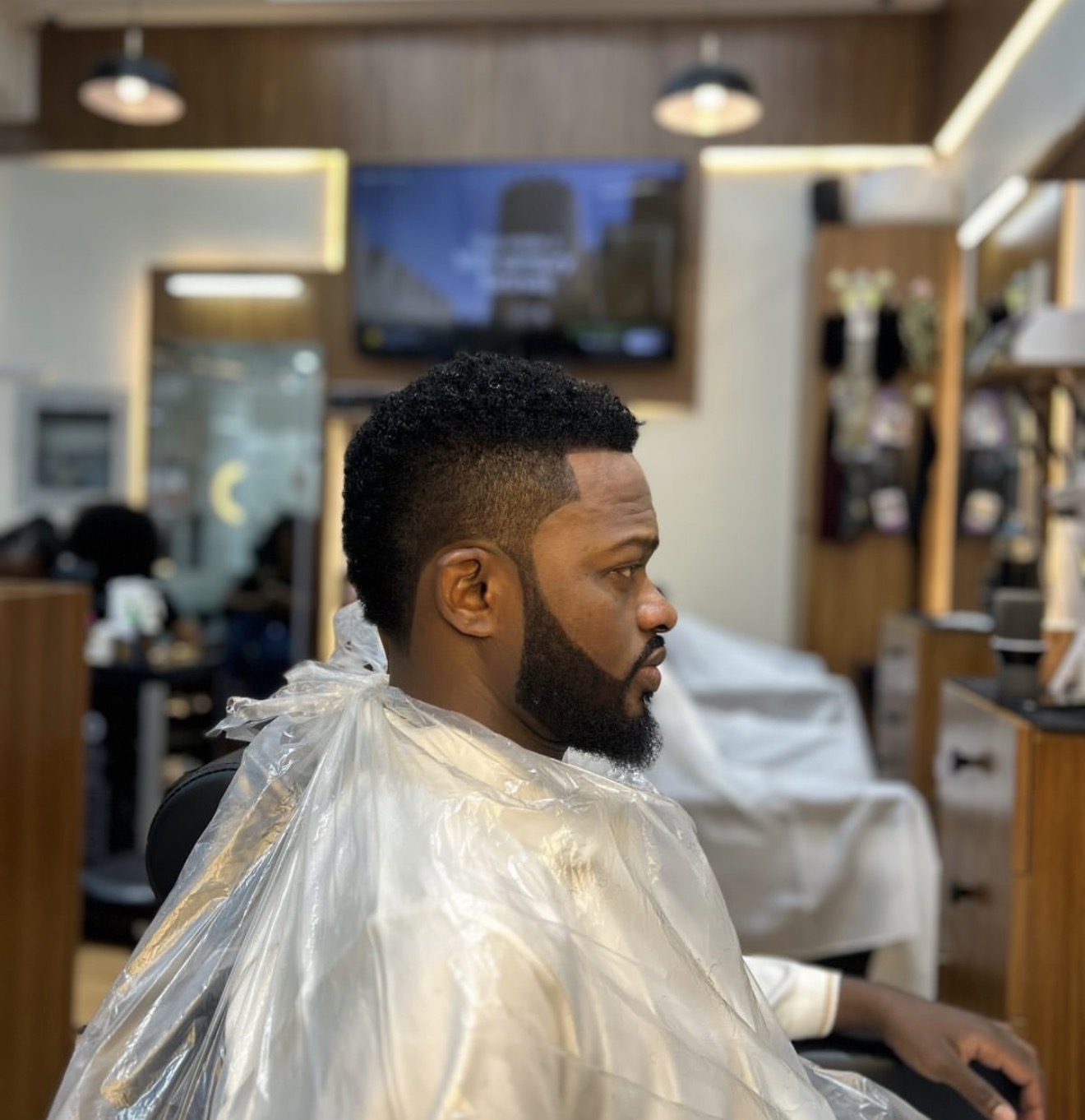 A precision haircut and beard at Empire Kings Barbershop